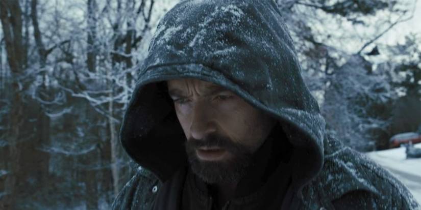 Keller (Hugh Jackman) walking through the snow in 'Prisoners.'