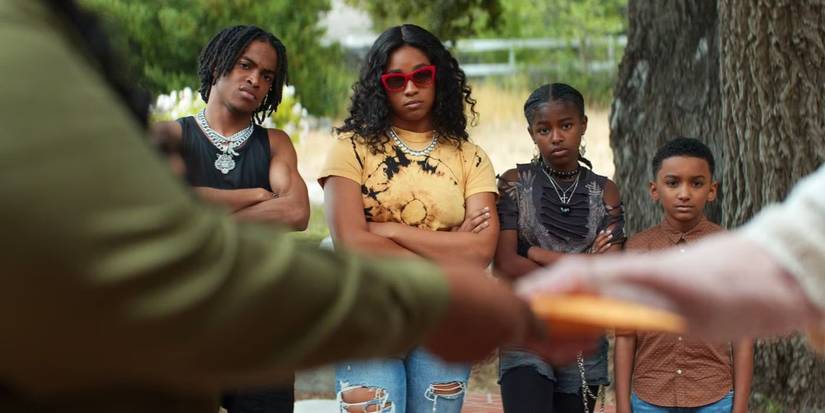 Simone Joy Jones as Tanya Crandell with her three younger siblings in Don't Tell Mom the Babysitter's Dead (1)-1