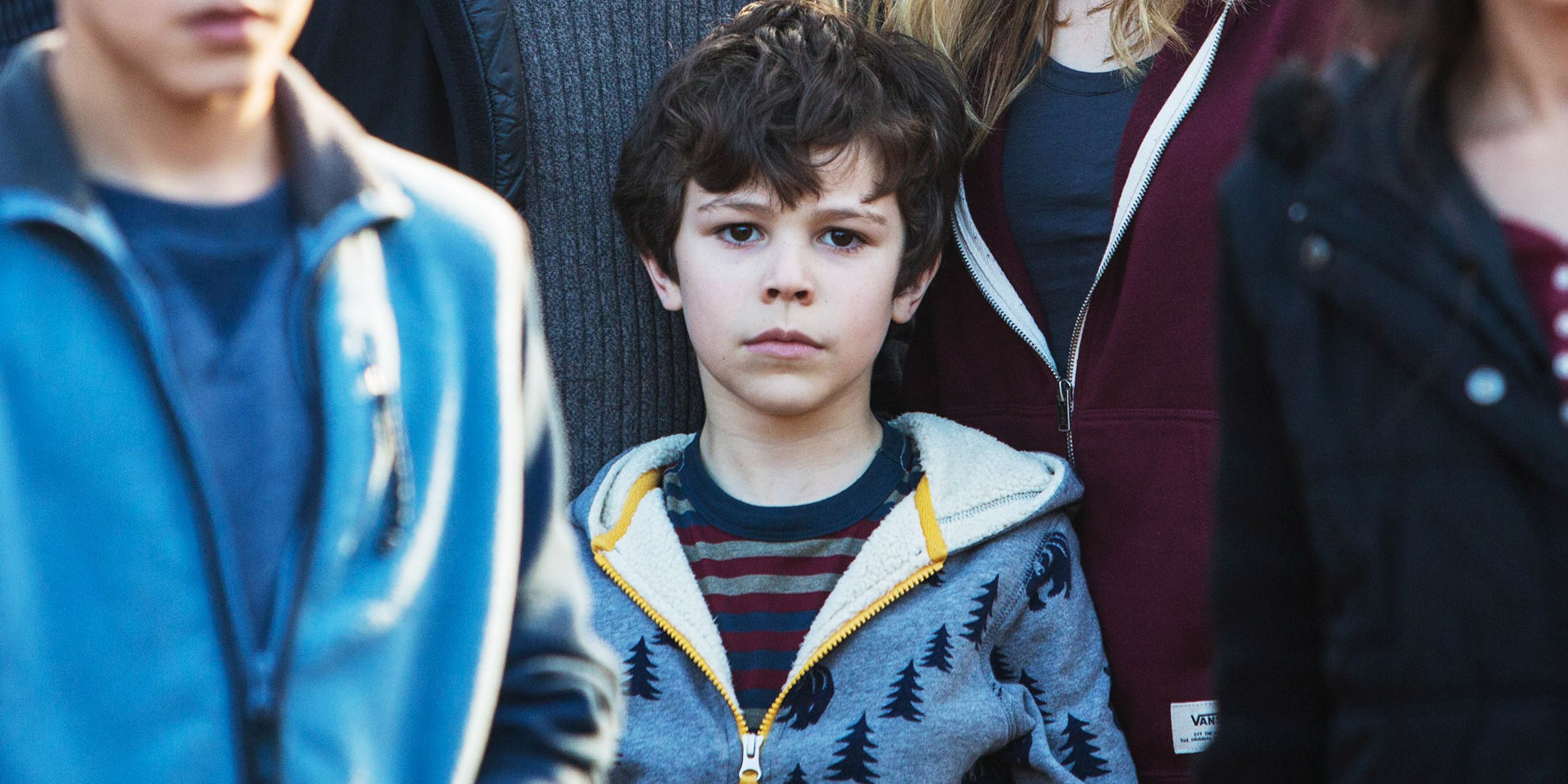 A child looking expressionless in The 5th Wave.