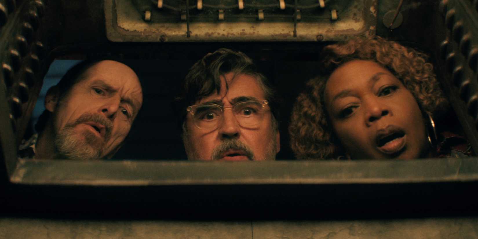 Dennis O'Hare, Alfred Molina, and Alfre Woodard peeking through a hatch in The Boroughs