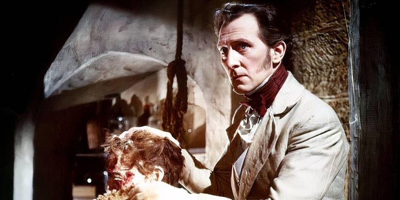 Victor Frankenstein holding a severed head in The Curse of Frankenstein