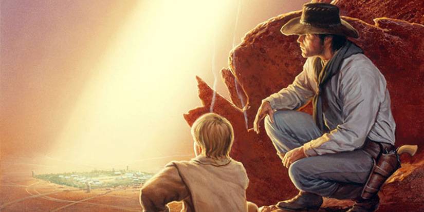 A cowboy with a cigarrette and a young boy in the desert in The Dark Tower VII_ The Dark Tower
