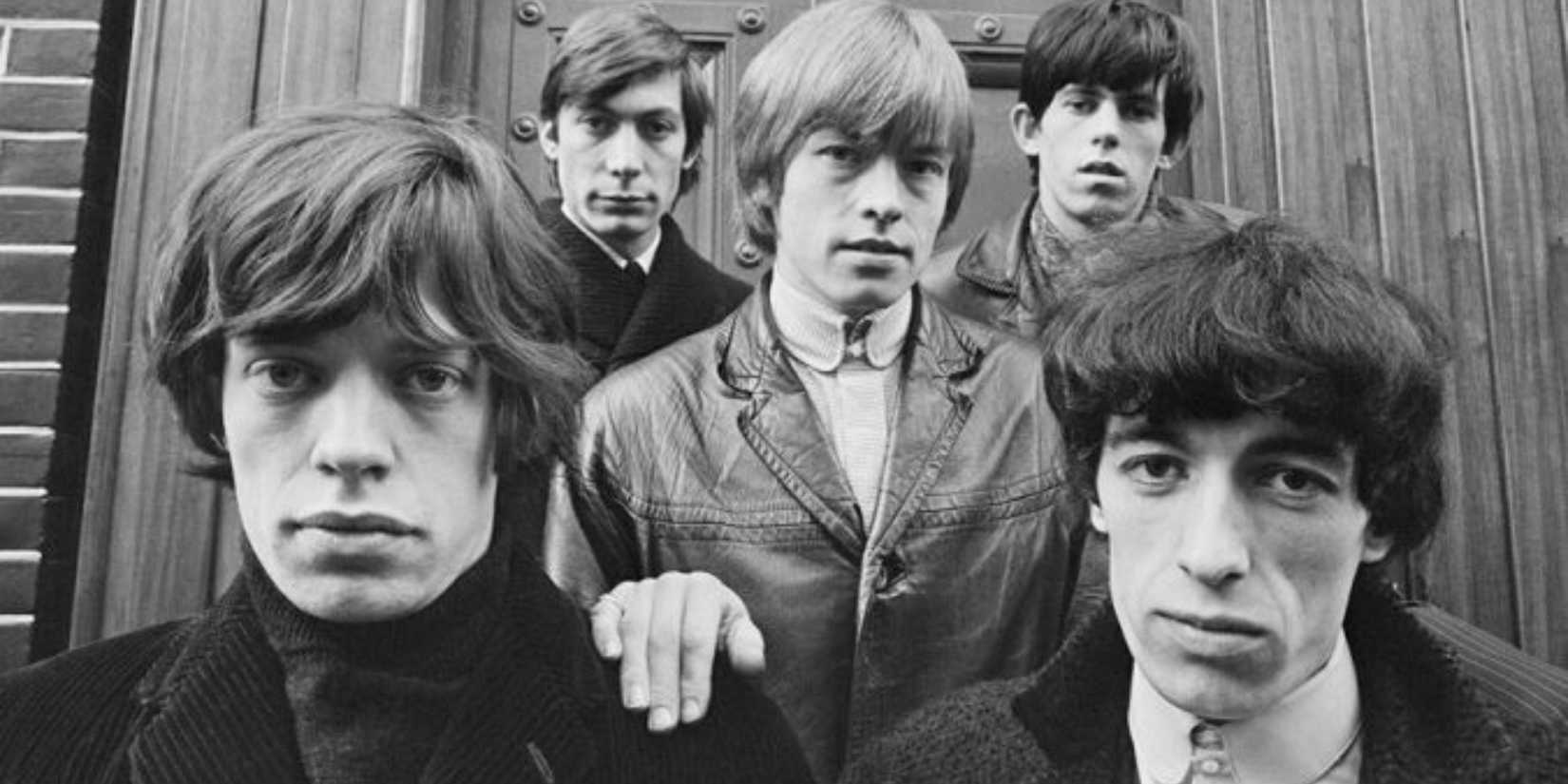 The Rolling Stones pose for a picture.