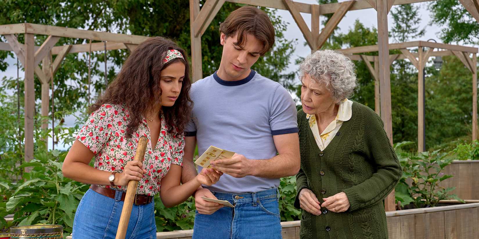 Jordan Doww, Julia Tomasone, and Jill Frappier standing together in a garden in The Way Home Season 4