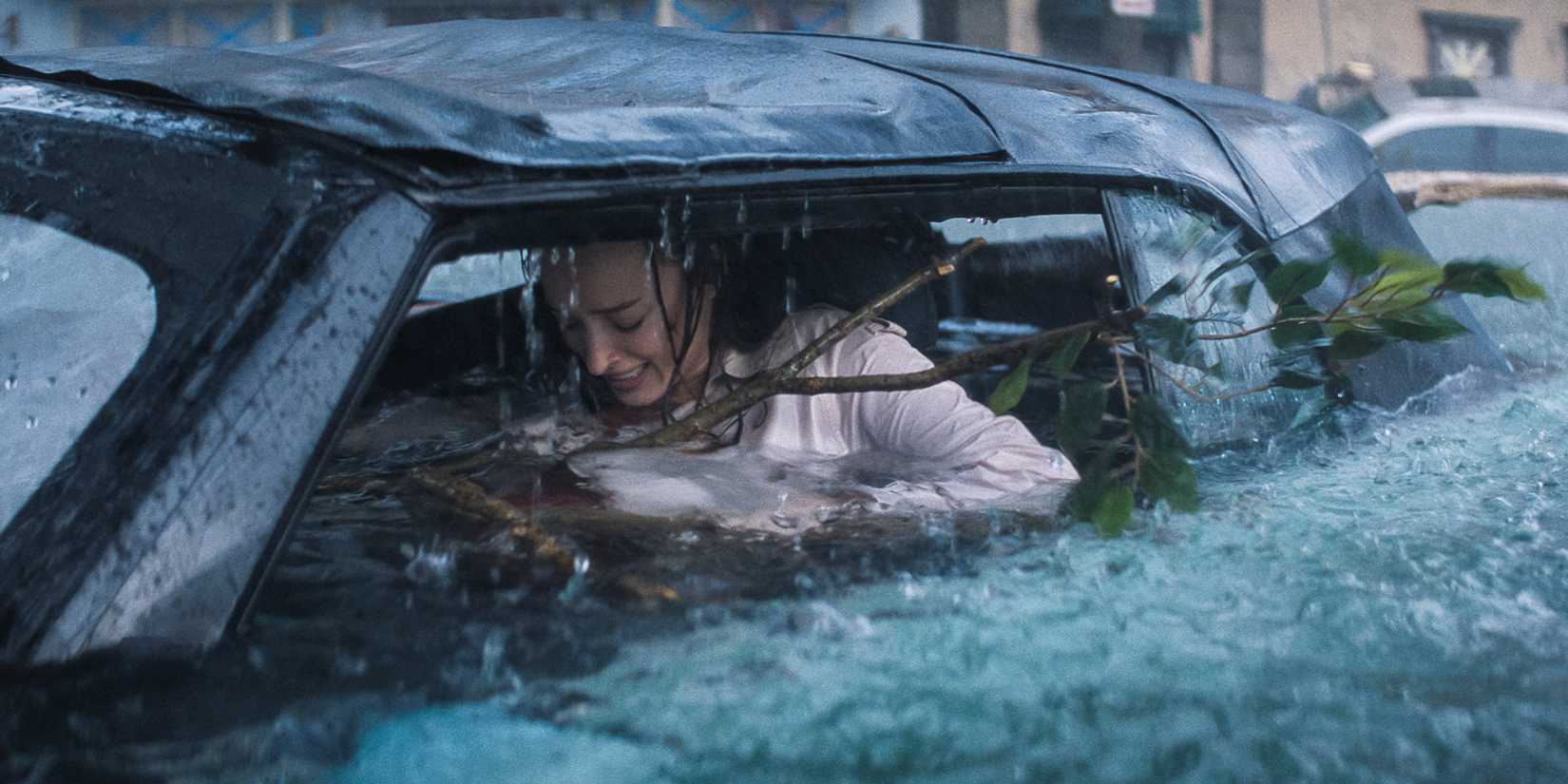 Phoebe Dynevor struggles to escape a flooding car in Thrash. 