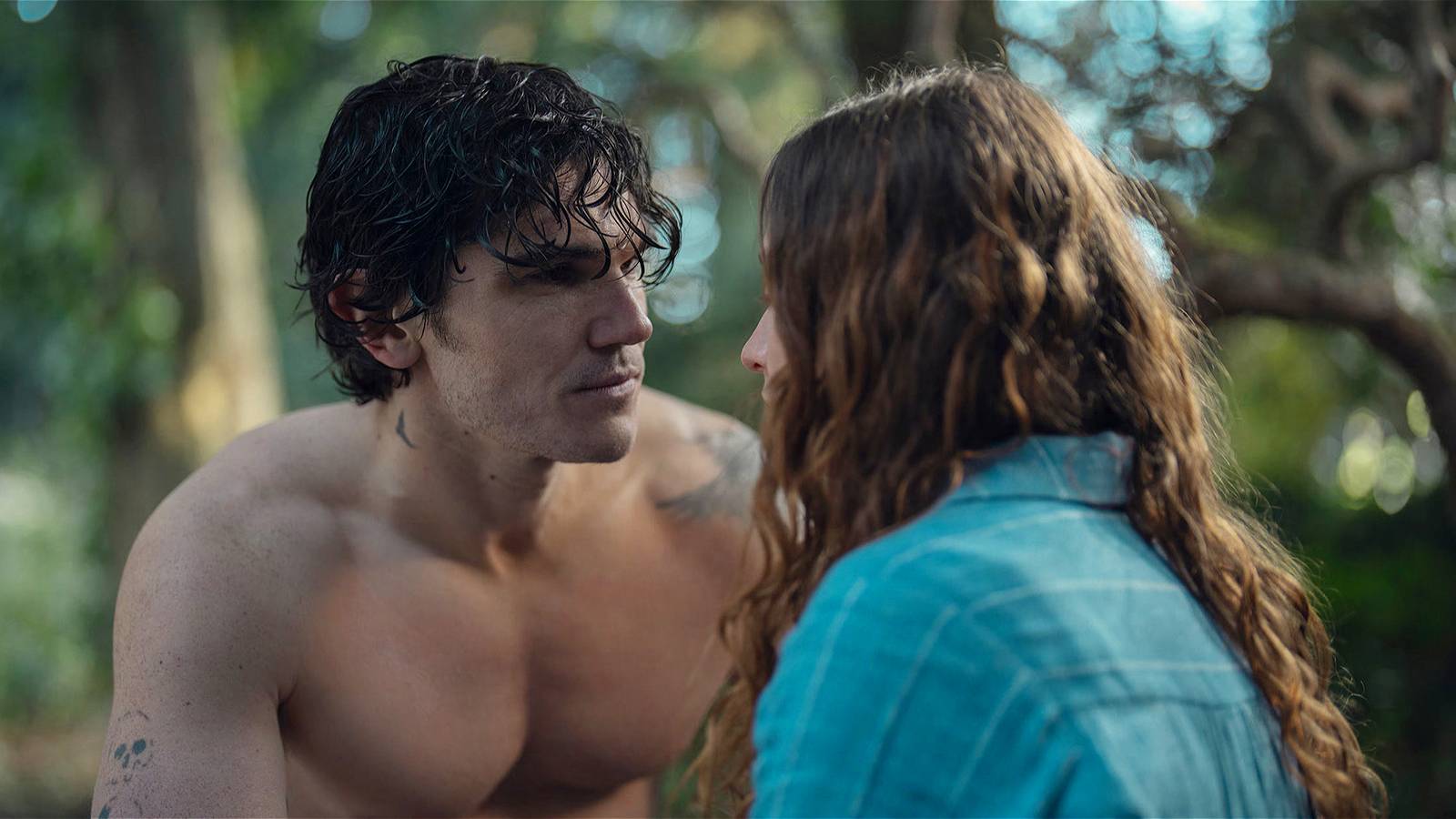 Fra Fee and Molly Windsor sharing an intimate moment in the woods in Unchosen