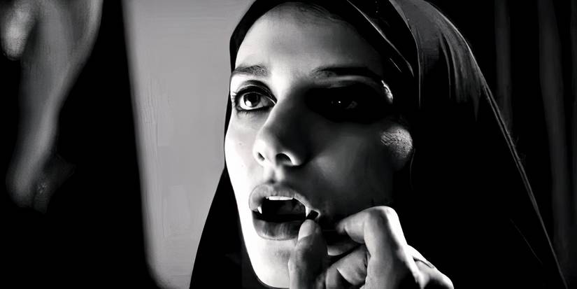 A young woman opens her mouth to reveal fangs in A Girl Walks Home Alone At Night.