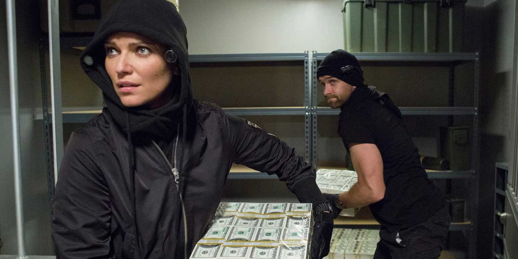 Ivana Milicevic and Antony Starr stealing money in Banshee