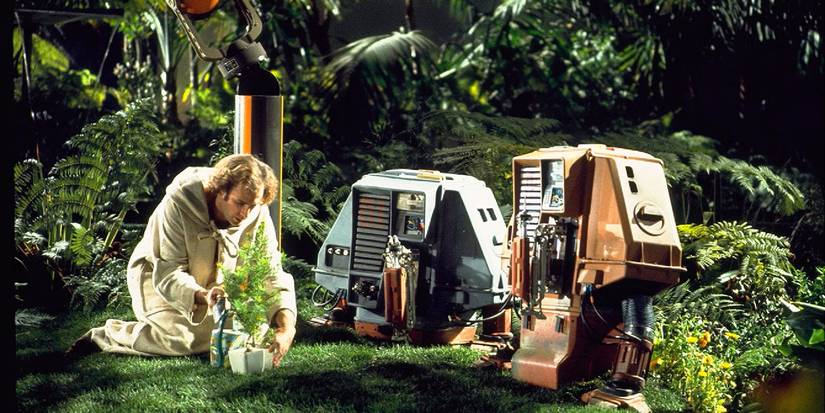 Bruce Dern in Silent Running touching a plant.