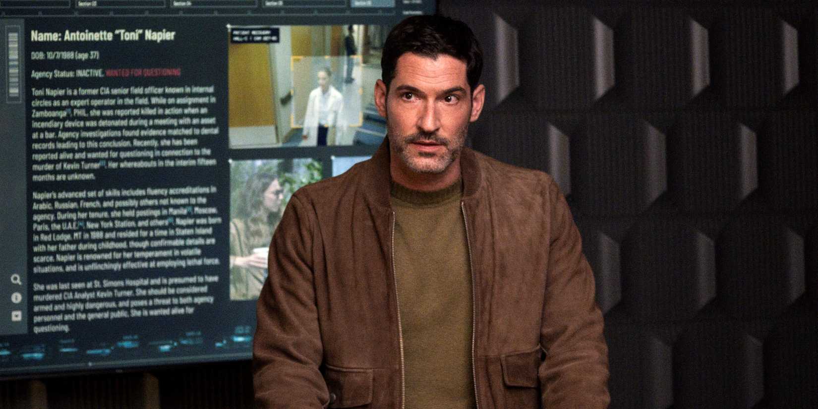 Tom Ellis as CIA Agent Colin Glass working in HQ on a case in the CBS series CIA