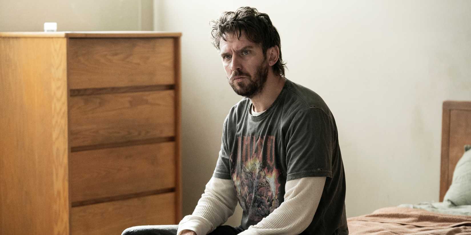 Dan Stevens as Pepper sitting on the edge fo the bed in his room at New Hyde Hospital in The Terror Season 3