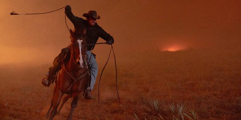 Cole Hauser on horseback during the ranch fire in Dutton Ranch Episode 1