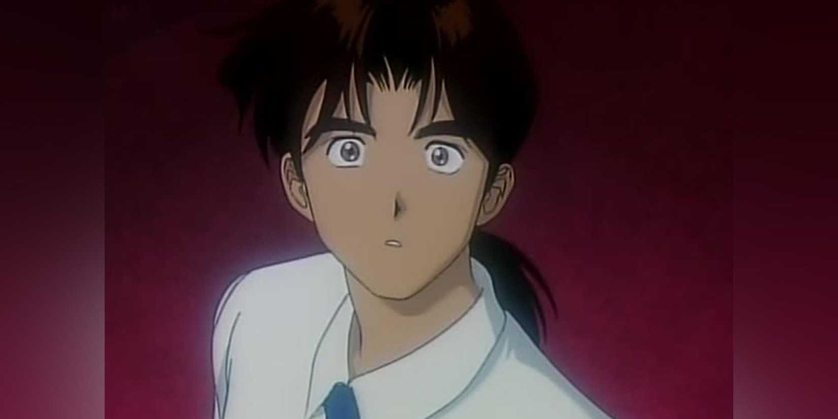 A character looking up at something offscreen in 'Golden Boy'