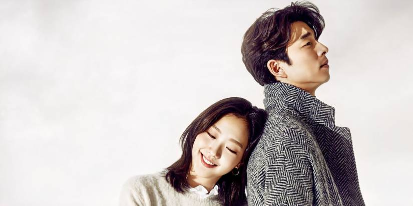 Ji Eun-tak smiling and leaning her head against Kim Shin's back in Guardian: The Lonely and Great God