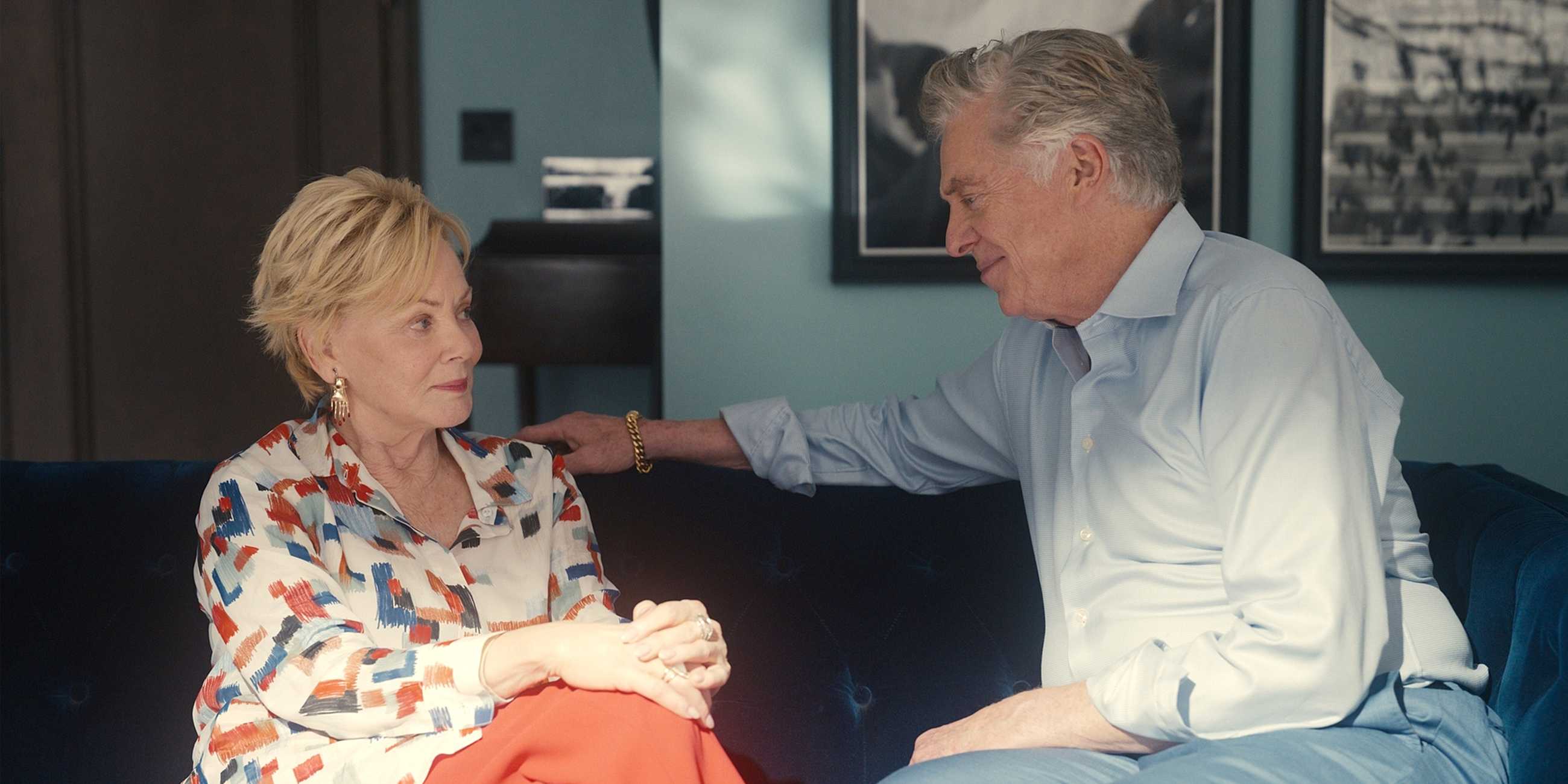 Jean Smart's Deborah smiling with Christopher McDonald's Marty in Hacks Season 5