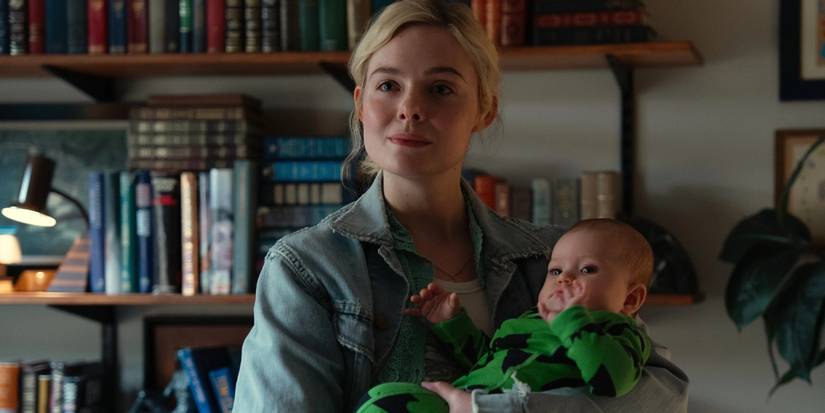 Margo (Elle Fanning) holding Bodhi in 'Margo's Got Money Troubles'