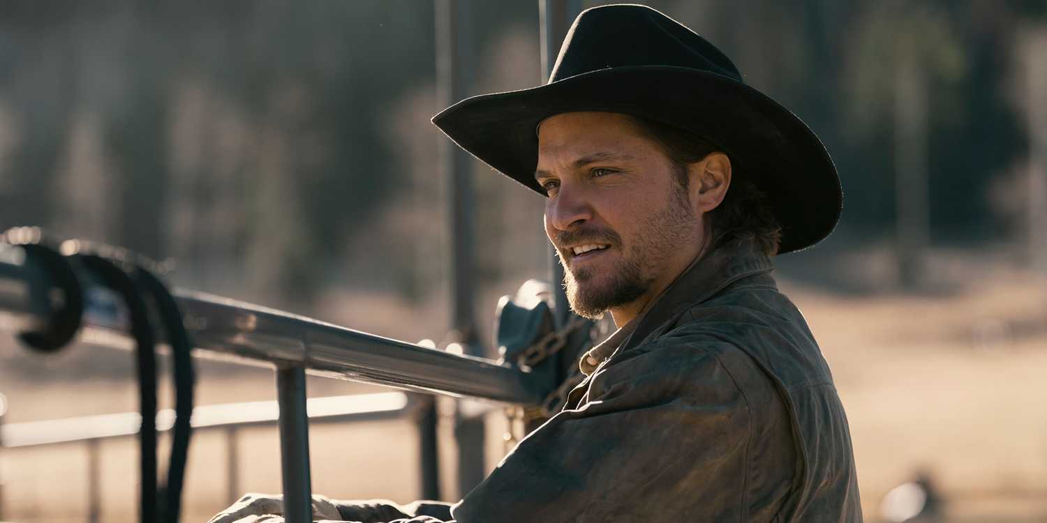 Kayce Dutton (Luke Grimes) looks beyond a fence in the 'Marshals' episode "Playing with Fire"
