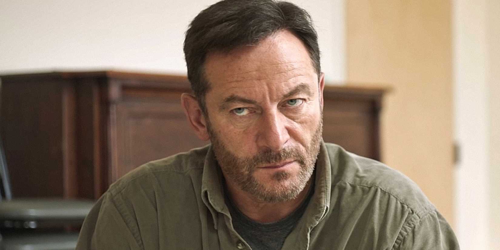 Jason Isaacs looking intently in Mass