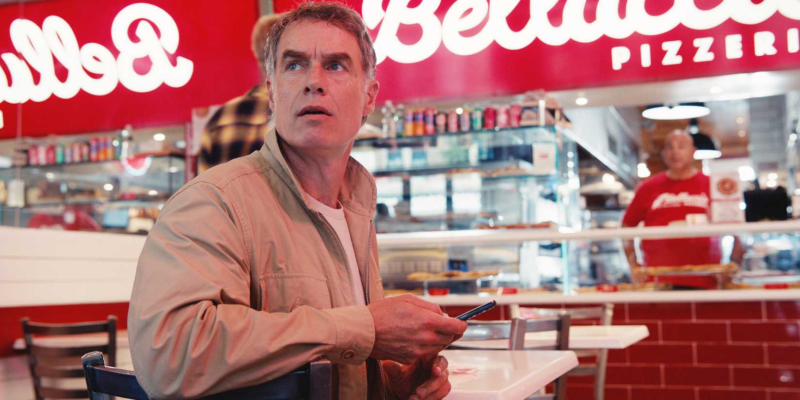Muray Bartlett turning around at a restaurant in Maximum Pleasure Guaranteed