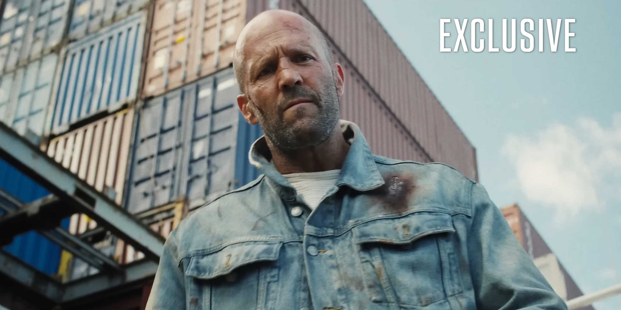 Jason Statham looking down at the camera in an exclusive image for Mutiny