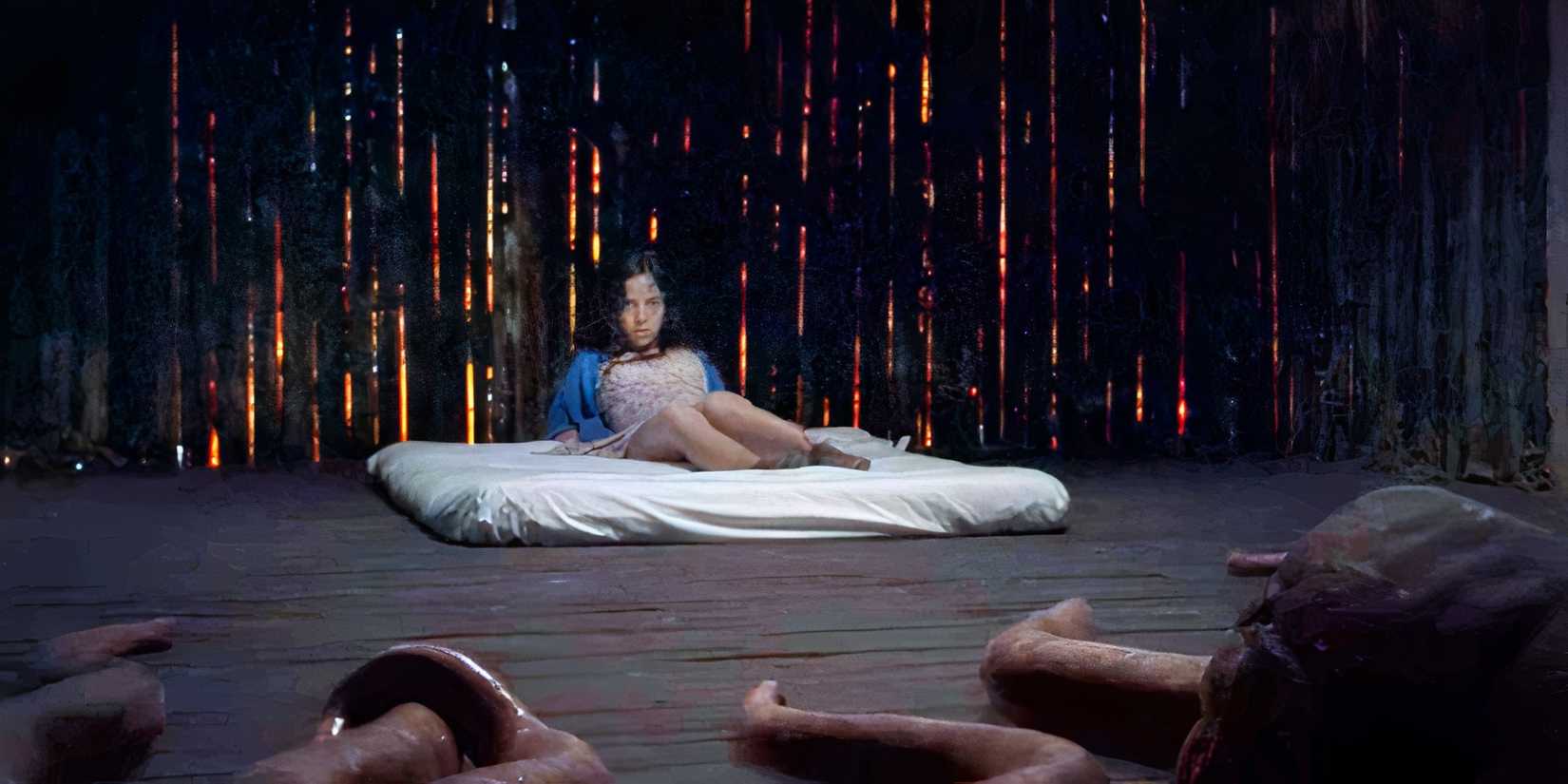 girl surrounded by tentacled alien in The Untamed
