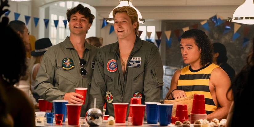 Beau, Dean, and John standing at table in 'Off Campus' Season 1, Episode 2.
