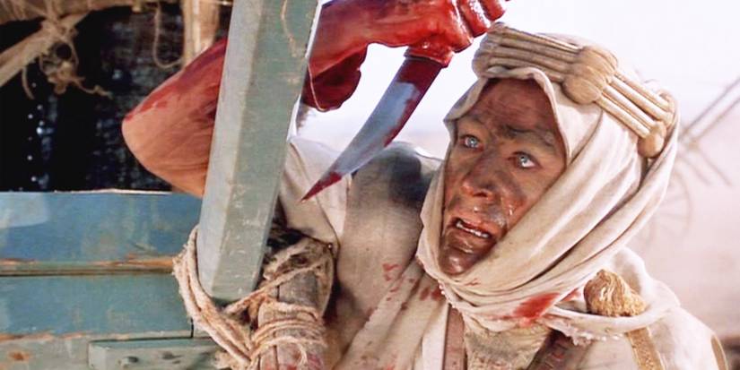 Peter O'Toole, bloodied, looking at his knife in 'Lawrence of Arabia'