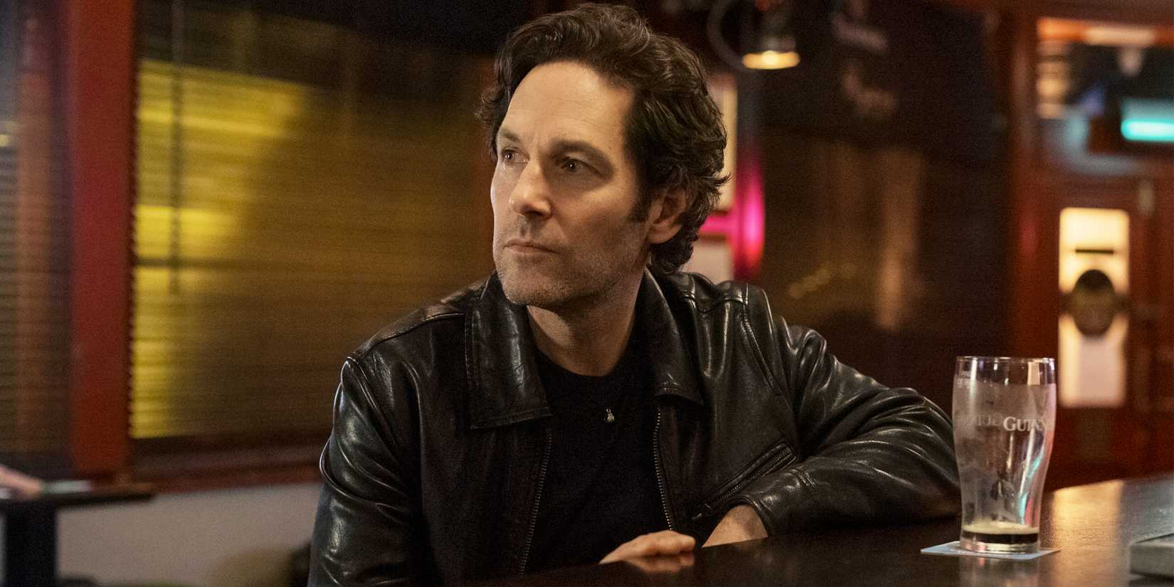 Paul Rudd sitting at a bar in Power Ballad.