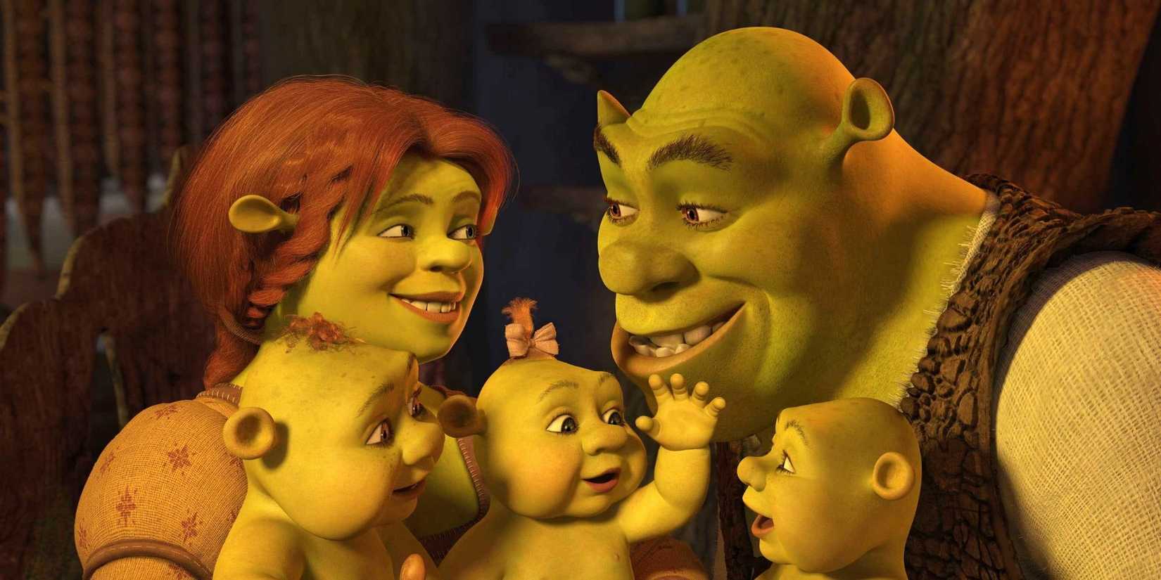 Shrek and Fiona smile at each other with their triplets in Shrek the Third