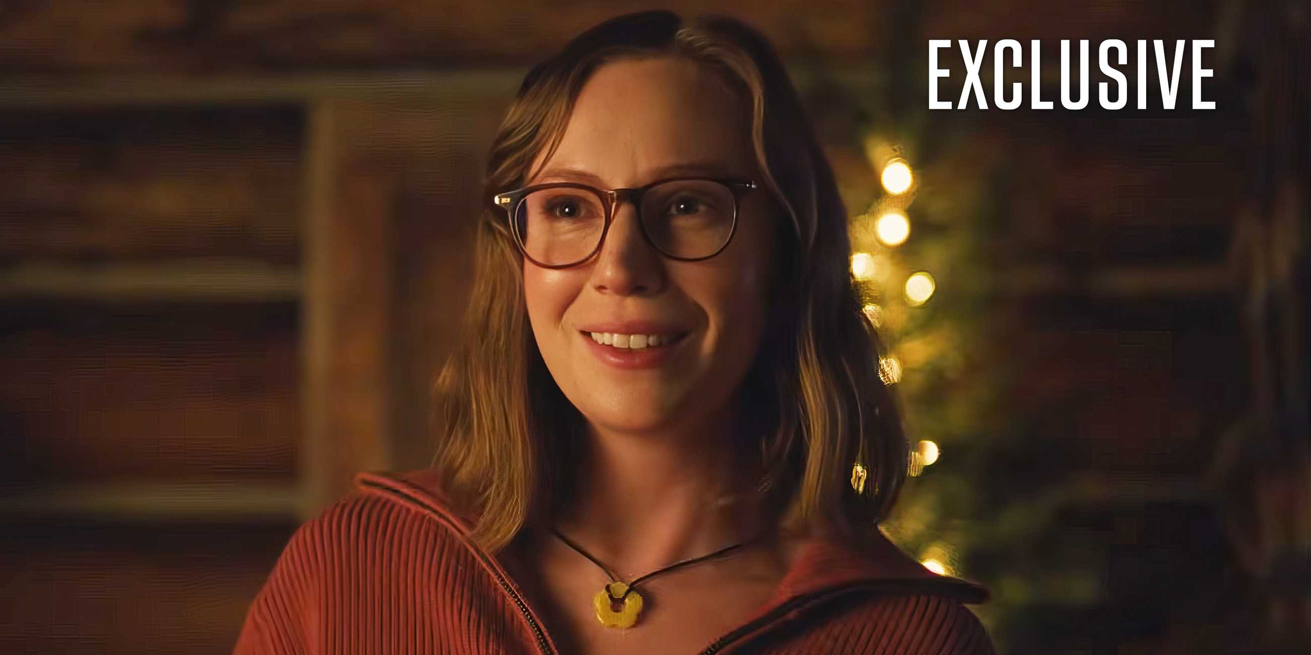 Hannah Einbinder smiling in an exclusive image for Teenage-Sex-and-Death-at-Camp-Miasma