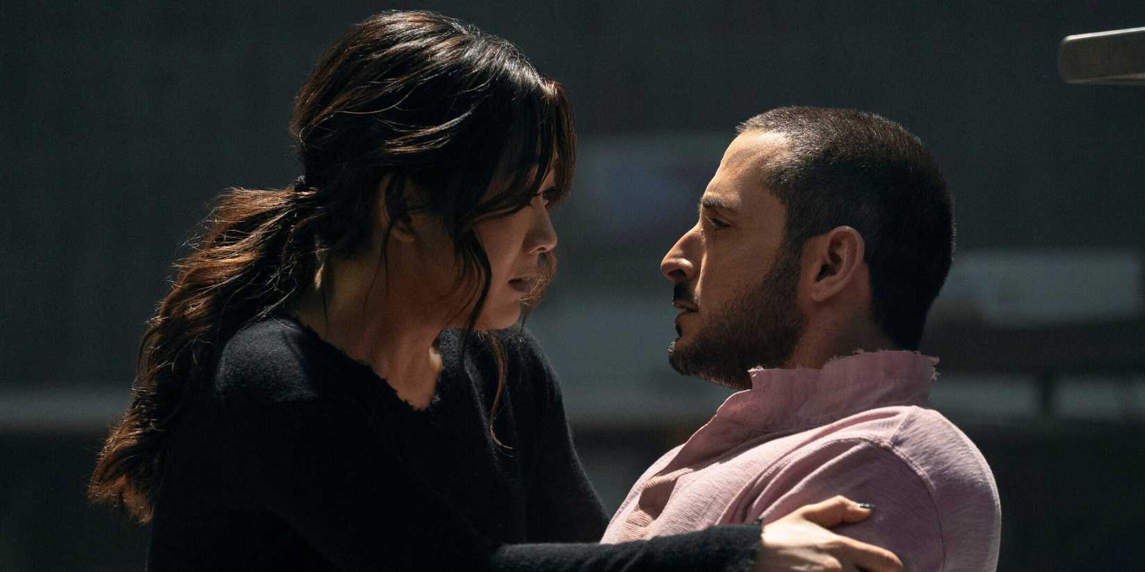Karen Fukuhara as Kimiko holding Tomer Capone as Frenchie as he lays dying on the ground in The Boys Season 5