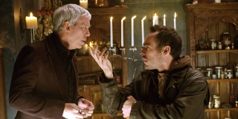 Bob (Terrence Mann) and Harry (Paul Blackthorne) looking at each other in 'The Dresden Files'