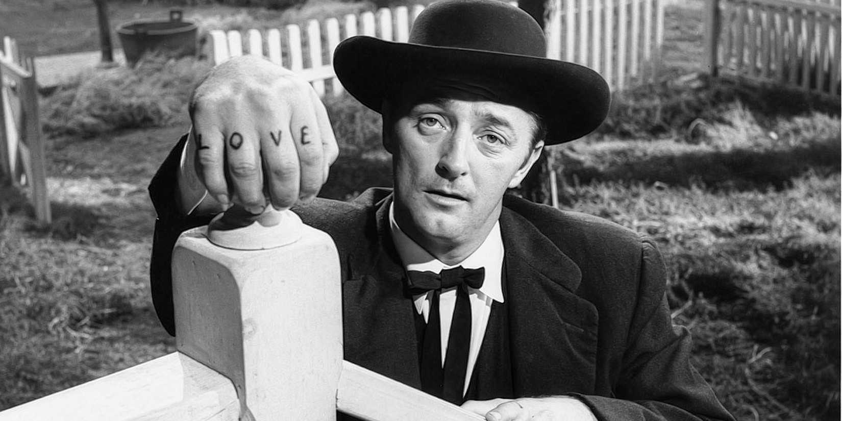 Robert-Mitchum looking at the camera in The-Night-of-the-Hunter