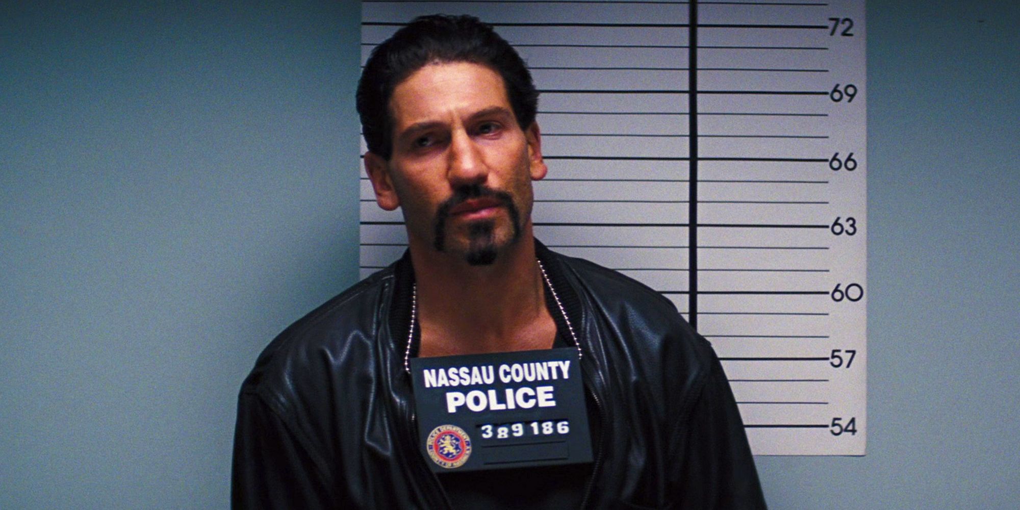 Mugshot of Brad Bodnick (Jon Bernthal) after being arrested in 'The Wolf of Wall Street.'