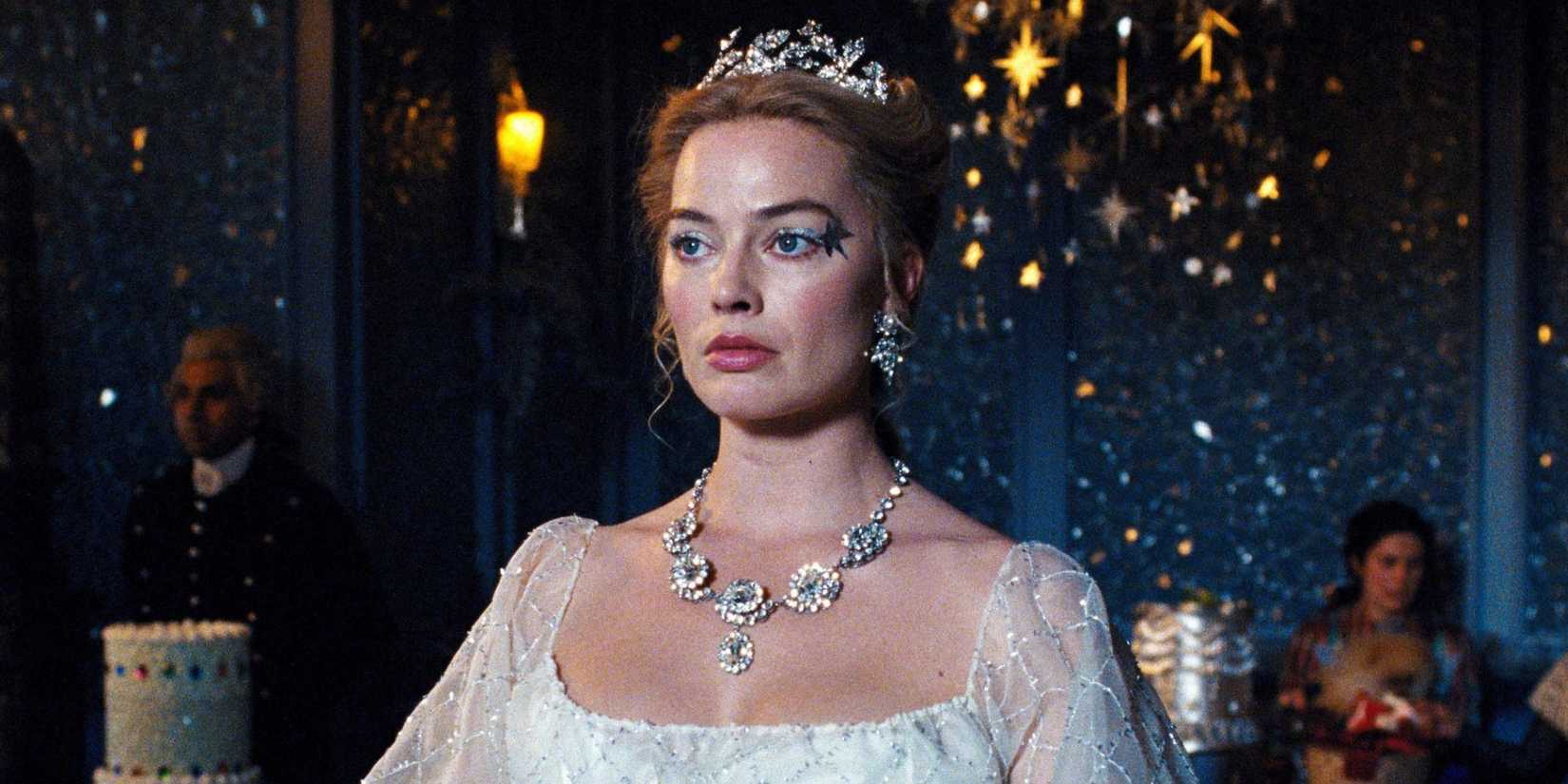 Margot Robbie dressed up in jewels as Cathy Earnshaw in Wuthering Heights.