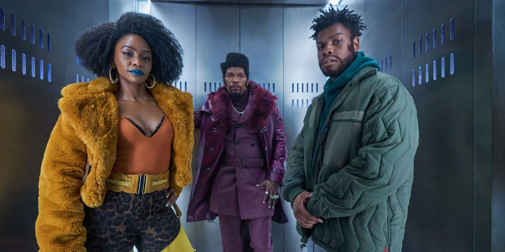 John Boyega, Jamie Foxx, and Teyonah Harris in They Cloned Tyrone.
