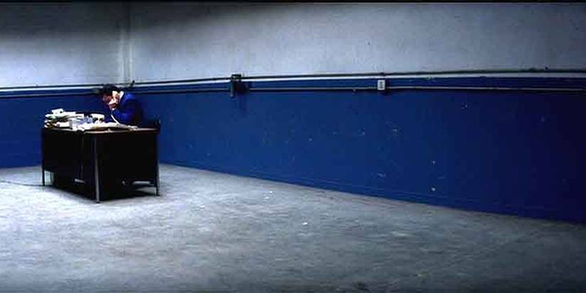 Adam Sandler at a desk in the opening of 'Punch-Drunk Love'