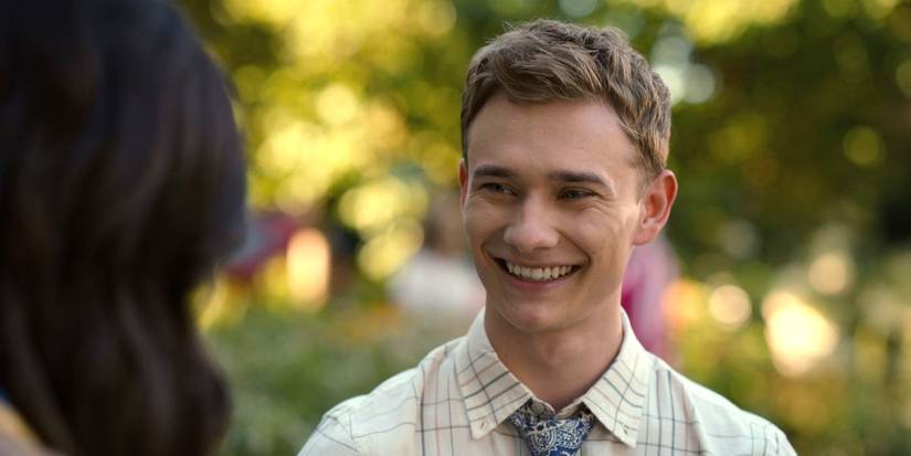 Aidan Merwarth as Noah smiles at someone with their back to the camera in Season 5 of Sweet Magnolias