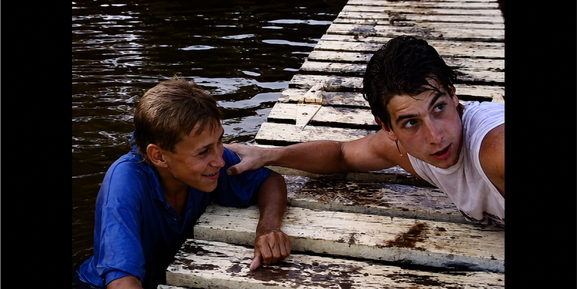 Two people a deck in Blood Lake