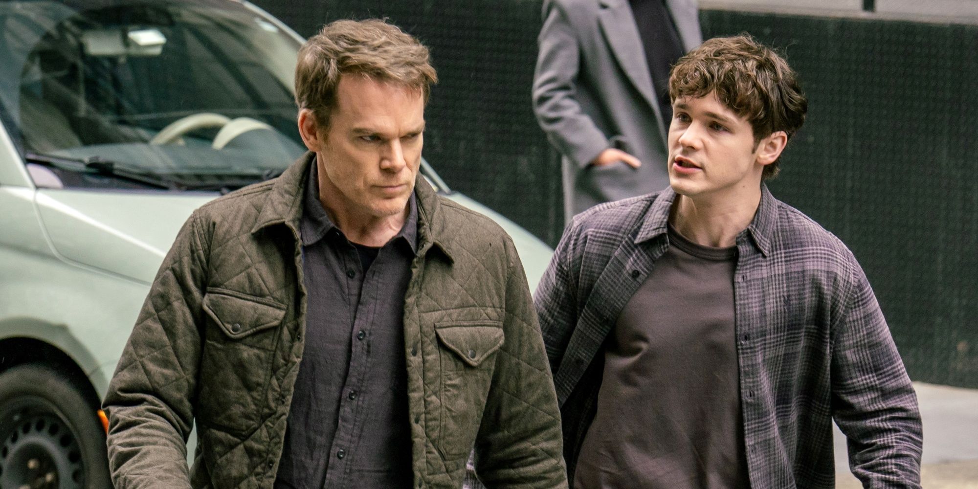Michael C. Hall as Dexter walking in New York with Jack Alcott as Harrison in Dexter: Resurrection