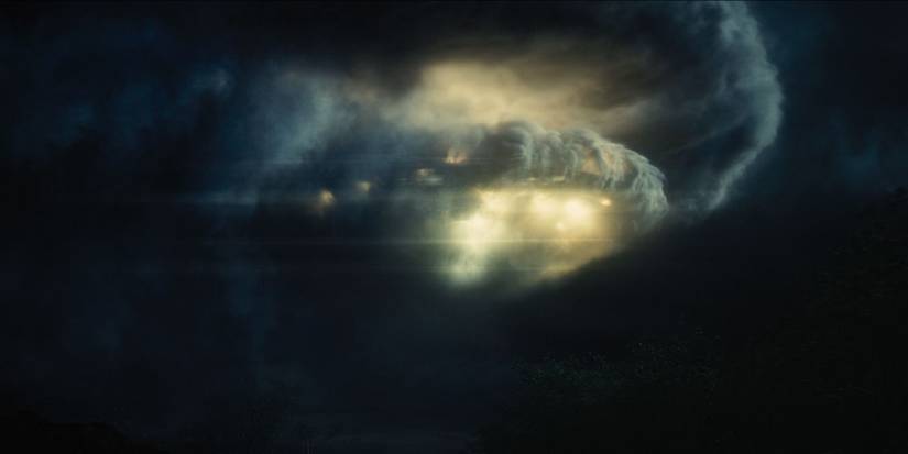 A UAP emerging from the clouds in Disclosure Day.