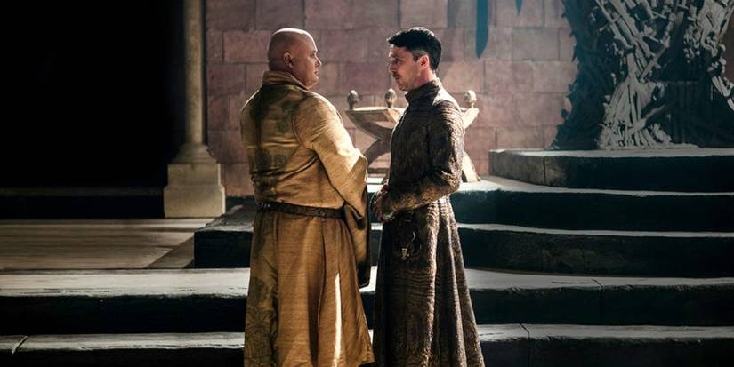 Lord Varys (Conleth Hill) and Littlefinger (Aidan Gillen) confront each other in front of the Iron Thrones in 'Game of Thrones' (2011-2019)