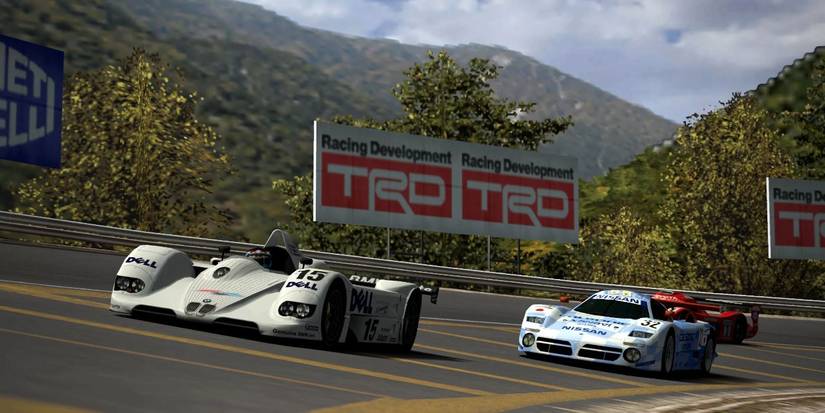 Two cars racing each other in Gran Turismo 4
