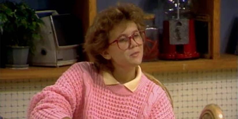 Carol sitting at the kitchen table in Growing Pains.