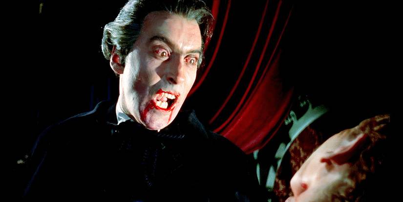 Dracula holding a man by the throat and baring his bloody fangs in Horror of Dracula