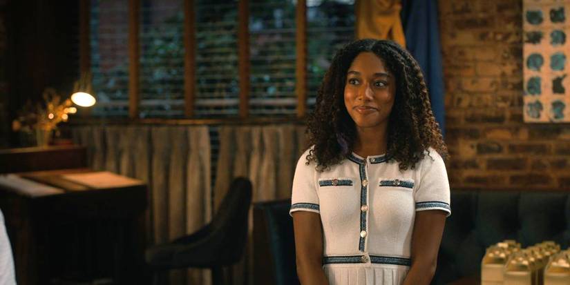 Iman Benson as Jessica smiles and looks off camera inside Sullivan's in Sweet Magnolias Season 5