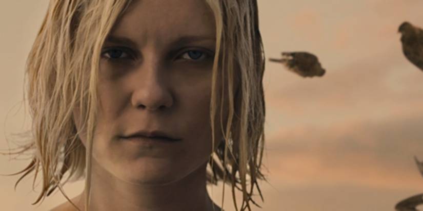 Kirsten Dunst with birds raining in the background in 'Melancholia'