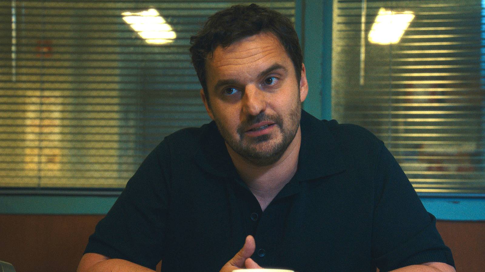 Jake Johnson Doesn't Think Karl Is a Villain in Apple TV's 'Maximum Pleasure Guaranteed'