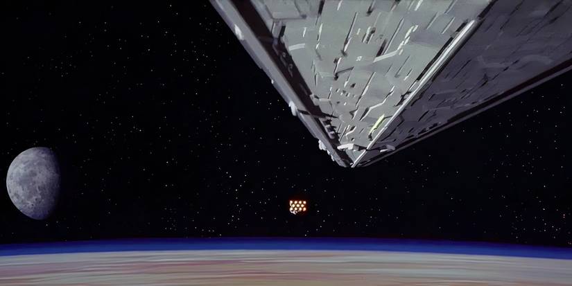 A star destroyer chases a rebel ship at the beginning of Star Wars Episode IV A New Hope.