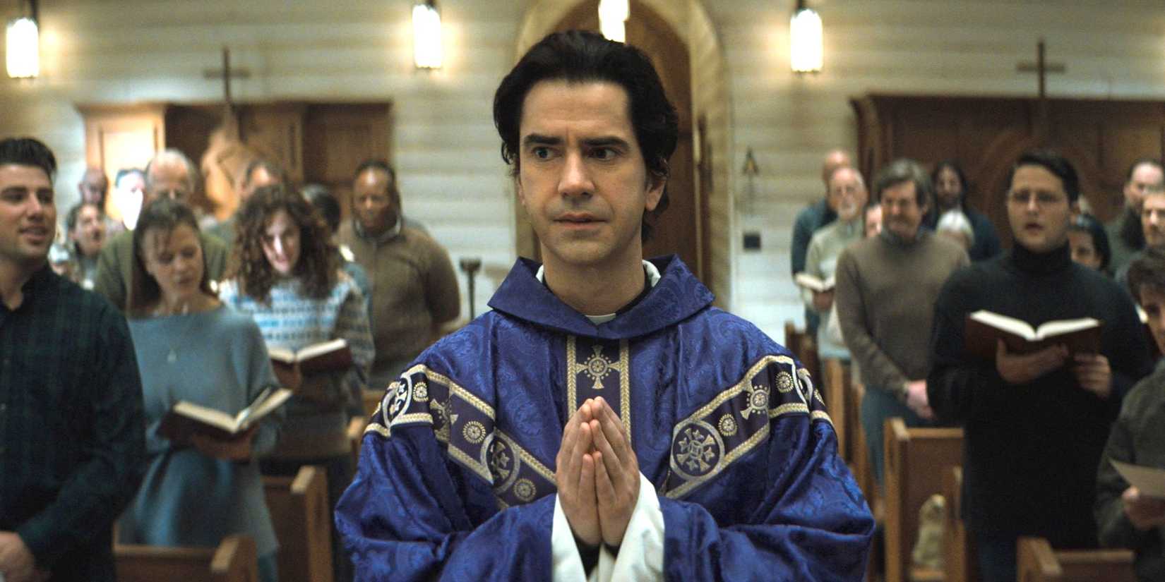 Hamish Linklater in priestly garb as Father Paul in Midnight Mass.